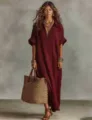 Casual burgundy short sleeve V-neck maxi dress paired with a woven straw bag detail. - Burgundy