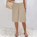 Short cargo décontracté beige pour femme avec taille élastique à cordon et poches. - S / Kaki