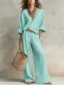 Relaxed resort two-piece set featuring a chic V-neck top and stylish wide-leg pants. - Lake Blue