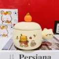 Cute ceramic coffee mug with lid and bear handle, creative cartoon design for daily use and gifts. - Yellow Bear Scarf