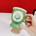 Vintage high-foot ceramic coffee mug with lily of the valley embossed green design. - 350ml / Retro Green Lily of the Valley