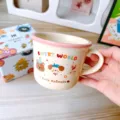 Ceramic coffee mug with cute animal print, pink rim and handle, perfect gift choice. - 400ml / Pink Dog