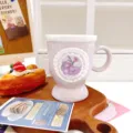 Light purple ceramic coffee mug featuring floral medallion and elegant footed base. - 320ml / Purple Gladiolus