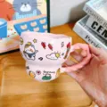Cute pink ceramic coffee mug with creative twisted handle and adorable cartoon cat doodle patterns. - Pink Cat
