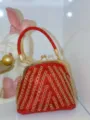Elegant red rhinestone evening bag with gold kiss lock and sparkling crystal handle. - Red