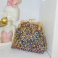 Stunning rhinestone embellished evening clutch detail, rainbow crystal kiss-lock design. - Colorful Zirconia