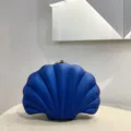 Blue acrylic shell clutch bag detail, evening party purse, unique shell design fashion accessory. - Blue