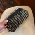 Elegant black rhinestone evening bag with gold geometric accents for chic party wear and weddings. - Black