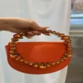 Orangefarbene Abendtasche mit funkelndem Kristall-Rundgriff und elegantem Design für Partys. - Seide Orange