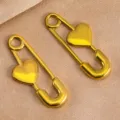 Stainless steel heart safety pin jewelry accessory detail shot, perfect for DIY crafting. - Heart Safety Pin (DZ4836) / 1 Piece (12x31mm) / Gold
