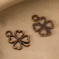 Retro bronze alloy four leaf clover pendant charms for DIY jewelry making and craft supplies. - 17x13mm / Antique Red Copper