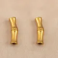 Close-up of golden curved bamboo tube spacer beads, premium stainless steel DIY jewelry finding. - 2-Section (23x6mm) / Gold