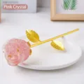 Artificial crystal resin rose flower craft ornament with gold stem placed on white plate - Rose Quartz - Gold Base