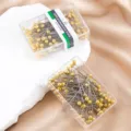 Stainless steel dressmaker pins with gold round heads, ideal for DIY sewing and crafts. - 100 Pcs/Box / Imitation Gold