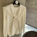 Pull-over blanc en 100% laine avec écharpe, haut d'automne confortable et élégant. - Blanc