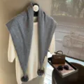 Women's grey knitted triangular scarf with pom-poms, cozy wool winter warm fashion accessory. - Solid Gray