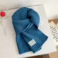 Blue knit scarf for women, trendy winter accessory with colorful dots, stylish and cozy design. - Scarf / Blue