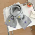 Grey knitted winter scarf featuring cute colorful butterfly embroidery and cozy warm design. - Gray