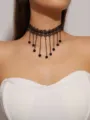 Elegant black lace choker necklace with hanging bead chains, vintage gothic jewelry style. - Hollow Lace Multi-Layer Black Crystal Beaded Choker (LKN021BK)