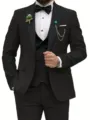 Detailed view of the men's formal suit jacket lapel, bow tie, and elegant brooch accessory. - Black