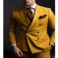 Detailed view of the stylish yellow double-breasted men suit jacket with brown tie, close-up - Earthy Yellow