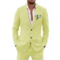 Close-up detail of the men's casual light yellow two-piece slim fit suit jacket. - Yellow