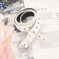 White heart cutout leather belt with metal buckle, stylish accessory for jeans and dresses. - Hollow Heart Buckle White