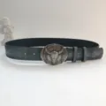 Close-up detail of vintage western leather belt with bull skull metal buckle for women. - Cement Gray (Antique Silver Buckle) / 107cm