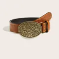 Detailed shot of a vintage western cowboy embossed leather belt with large oval carved buckle. - Length 102cm / Brown