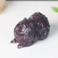 Natural crystal Pomeranian dog figurine, resin-filled gemstone for lovely home decor. - Garnet