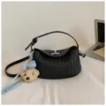Black woven leather underarm shoulder bag with cute teddy bear charm for women daily commute. - With Pendant / Black