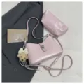 Pink PU leather shoulder bag set with matching pouch and cute plush charm variant - Pink With Pendant