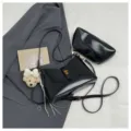 Black glossy PU leather shoulder bag set with pouch and cute bear pendant for women chic daily use. - Black With Charm