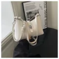Minimalist white shoulder underarm bag for women, chic casual daily commuting handbag with metal lock. - White