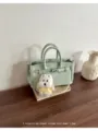 Classic lychee grain leather handbag with elegant Kelly bag design, versatile daily commuter bag. - With Pendant / Green