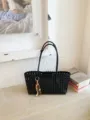 Black hollow woven shoulder bag for women, stylish underarm tote with chic wooden bead charm. - With Pendant / Black