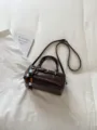 Retro dark brown leather shoulder bag with chic bead pendant, versatile daily crossbody bag. - With Pendant / Coffee