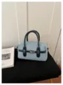 Stylish denim boston handbag with leather trim and metal lock, casual shoulder crossbody bag. - Light Blue With Black