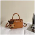 Retro women's brown suede handbag casual fashion shoulder crossbody bag with bear pendant - With Pendant / Brown