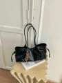 Black PU leather casual tote bag with double handles and cute braided charm pendant for daily commute. - Black with Charm