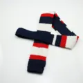 Men's knitted necktie featuring classic navy, white, and red stripes for formal and casual use. - Blue White Red Stripe