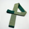 Men's green knitted tie with gold geometric dot pattern, stylish flat-tipped formal necktie. - Green and Gold Geometric