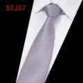 Men's grey business formal silk jacquard necktie with white shirt collar display variant. - Gray Jacquard (STJ37)
