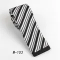 Men's black and white striped knitted tie, classic flat end design for formal wear. - Black & White Striped
