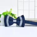 Men's knitted bow tie featuring dark blue fabric with elegant white and light blue stripes. - Dark Blue with Light Blue and White Stripes (ZZLJ40)