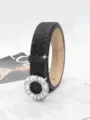 Detailed shot of a stylish women's black rhinestone belt with a sparkling round buckle. - 2.8cm Round Buckle / Black
