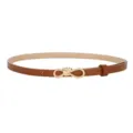 Close-up of stylish brown women's thin leather belt with elegant golden knot buckle design. - Camel