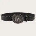 Detailed view of the Y2K vintage black studded leather belt featuring a carved horse head oval buckle. - Black