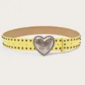 Close-up detail of the yellow leather belt featuring double-row metal studs and heart buckle. - Length 105cm Width 3.8cm / Yellow