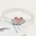 Detailed shot of trendy rhinestone heart wing belt with sparkling pink stones for daily wear. - White / Length 105cm Width 2.8cm
